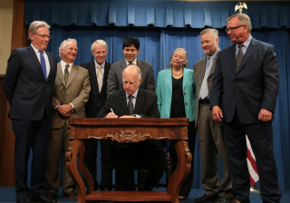 Gov. Jerry Brown signing SGMA into law in 2014.