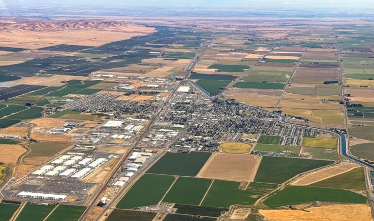 The agricultural community of Quincy, Washington, population 6,220, opened its doors to a Microsoft data center in 2006. The tech giant sought room to grow and cheap, abundant power from nearby Columbia River hydropower. The data center’s opening saw the owners presented with beans from the last crop harvested on the site. Tedder via Wikimedia Commons