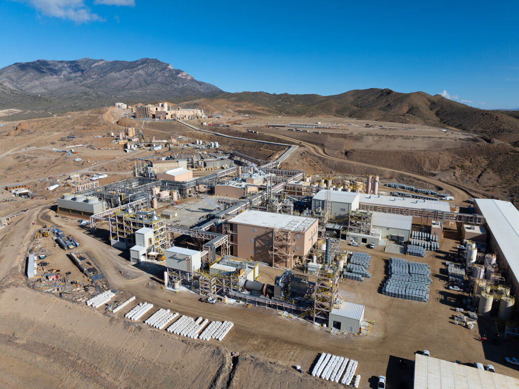 Processing facilities at the Mountain Pass mine, which currently produces sacks of rare earths ore (foreground in white) for further separation off-site. Erik Olsen