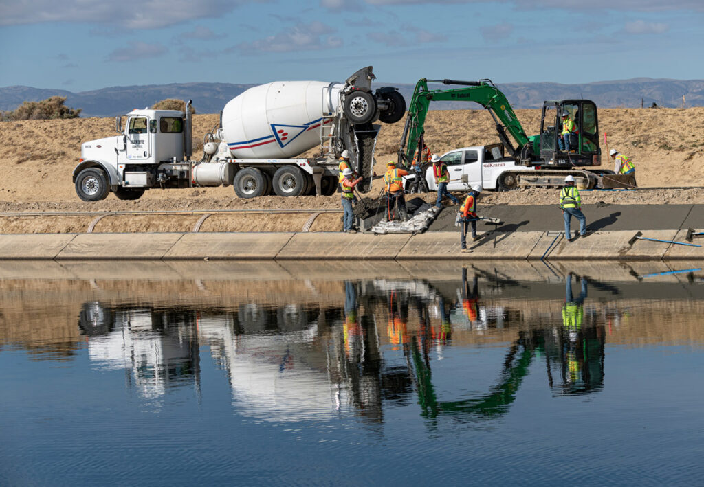 Contractors at work repairing subsidence-related damage to the California Aqueduct in Kern County in 2021.
Andrew Innerarity/ California Department of Water Resources