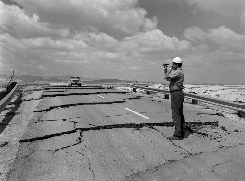 A solved problem roars back In April 1966, a California Department of Water Resources field engineer examined cracks caused by subsidence, on a closed roadway near Taft in Kern County.  Vince Arrant / California Department of Water Resources