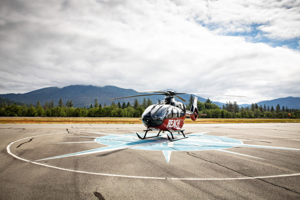An emergency response helicopter waiting at a pad near Grants Pass, Oregon.